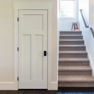 White door adjacent to stairs