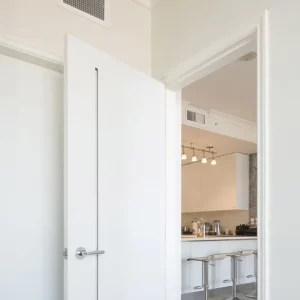 interior white door through kitchen